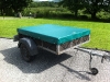 trailer cover helps to keep items dry and protects the trailer from the elements.